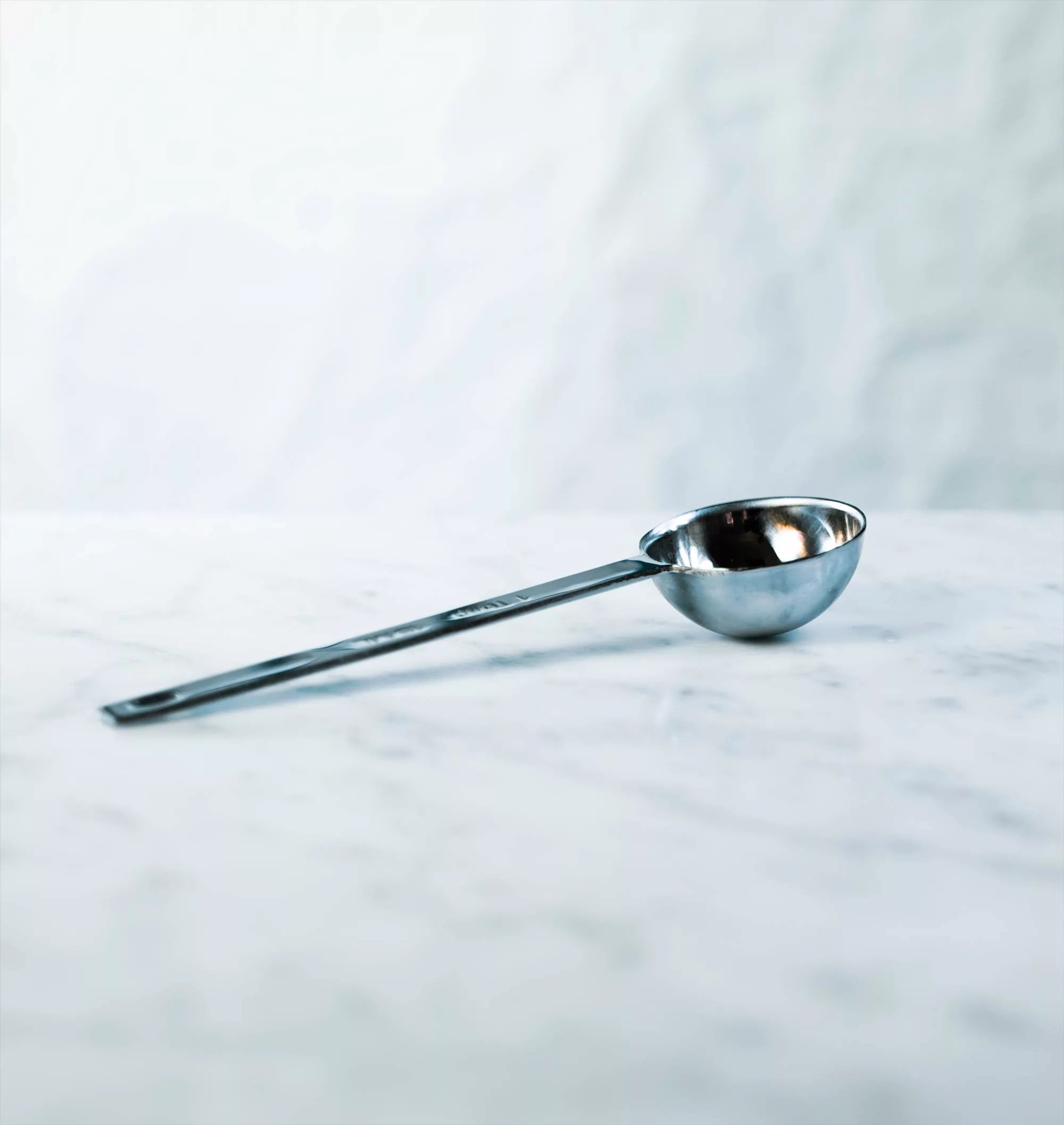 Metal tablespoon for measuring tea