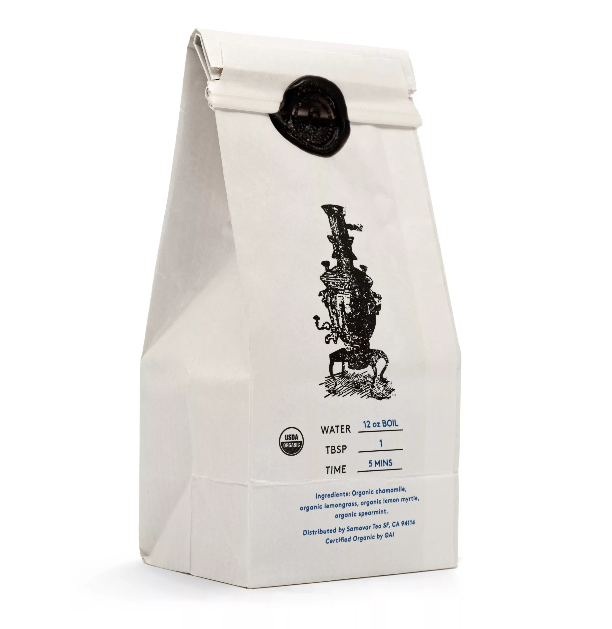 A Chamomile Twist tea bag displayed on a clean white surface, highlighting its vibrant design.