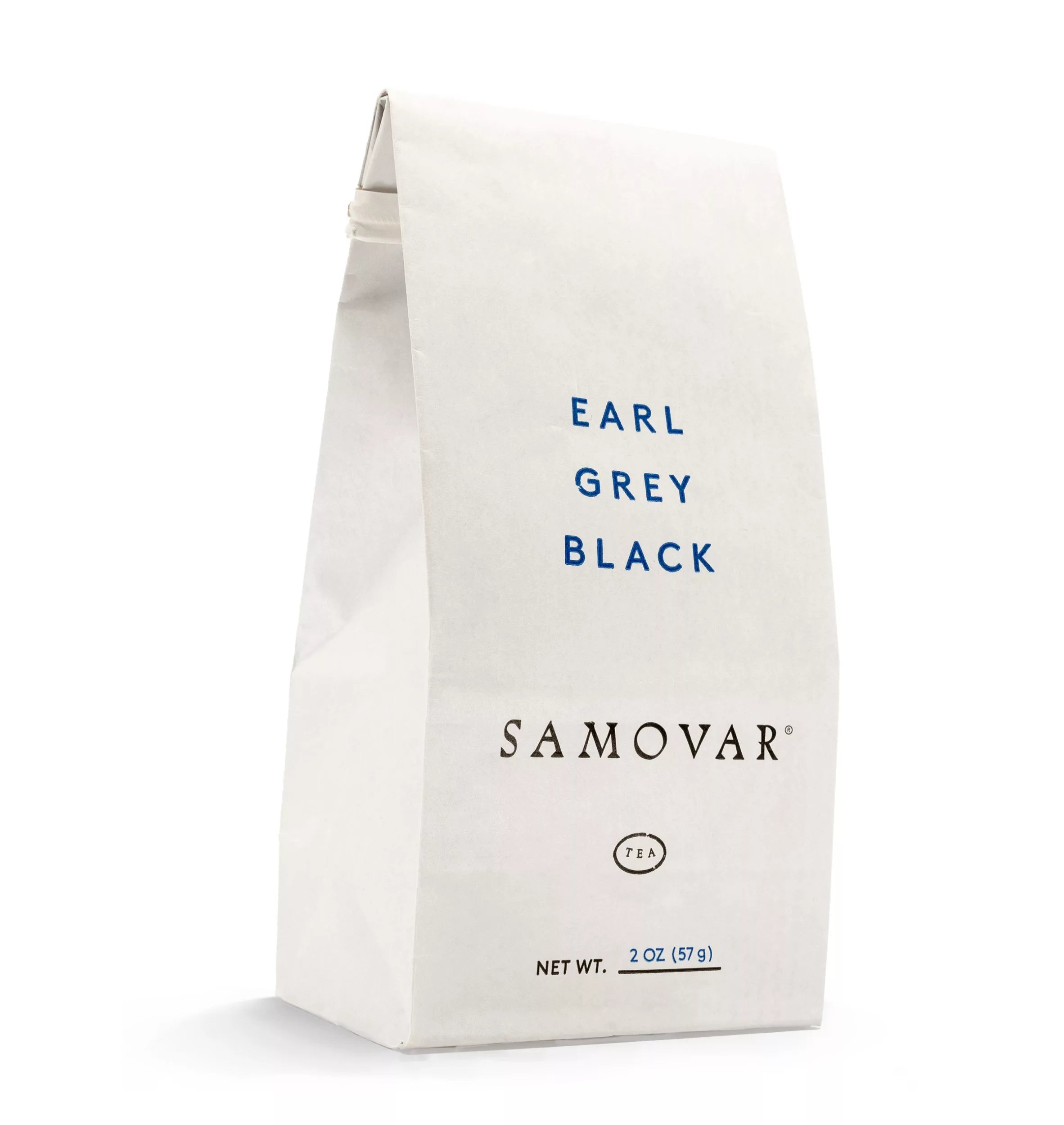 Accompanied by an Earl Grey tea packet, representing a traditional tea brewing scene.